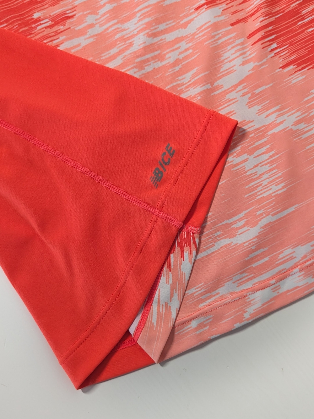 New Balance NBIce Running Shirt, Coral Pink Graphic, Mesh Short Sleeve, Small - Picture 7 of 9